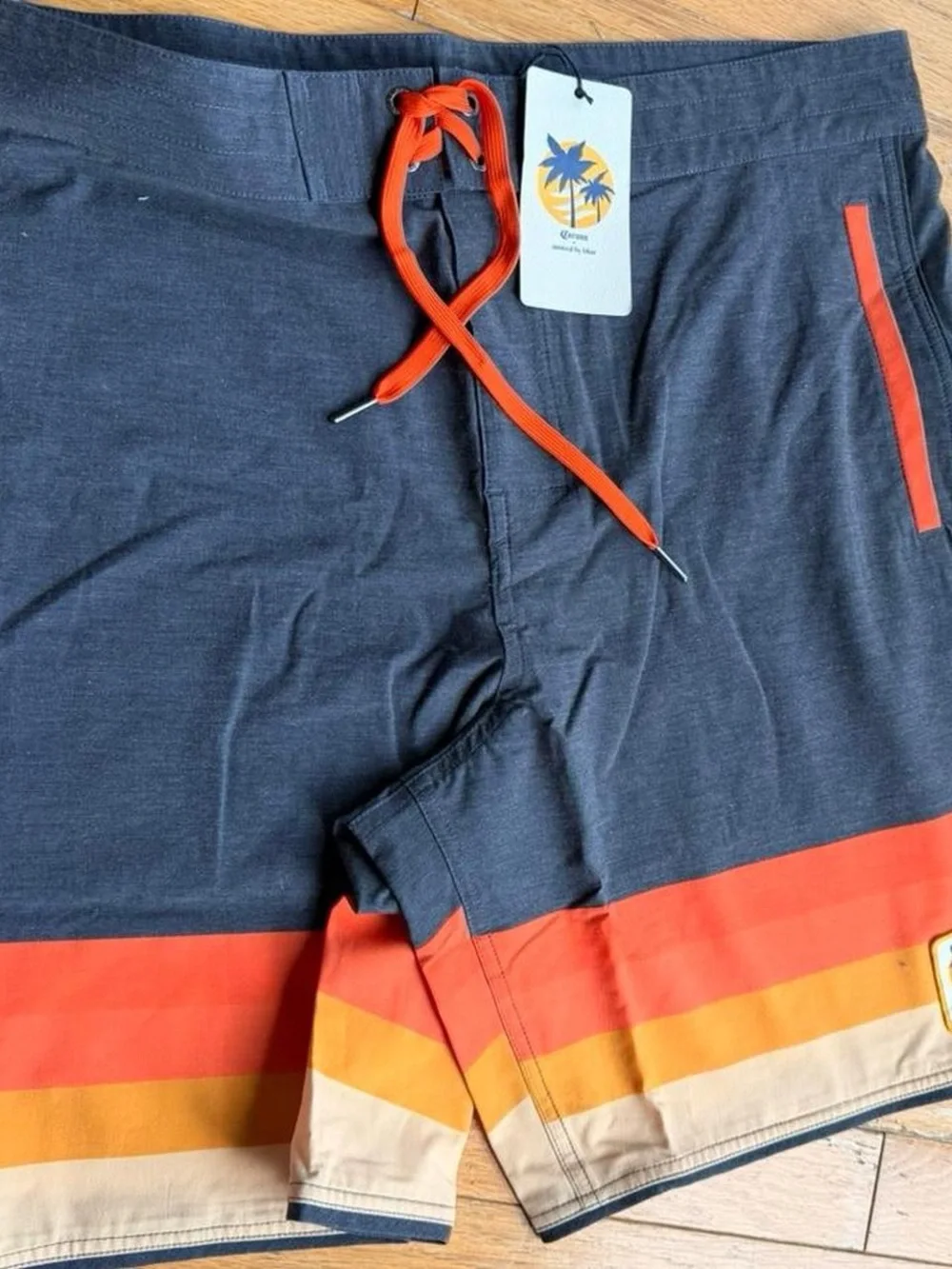United By Blue Navy Swim Board Shorts with Orange Stripe Accents